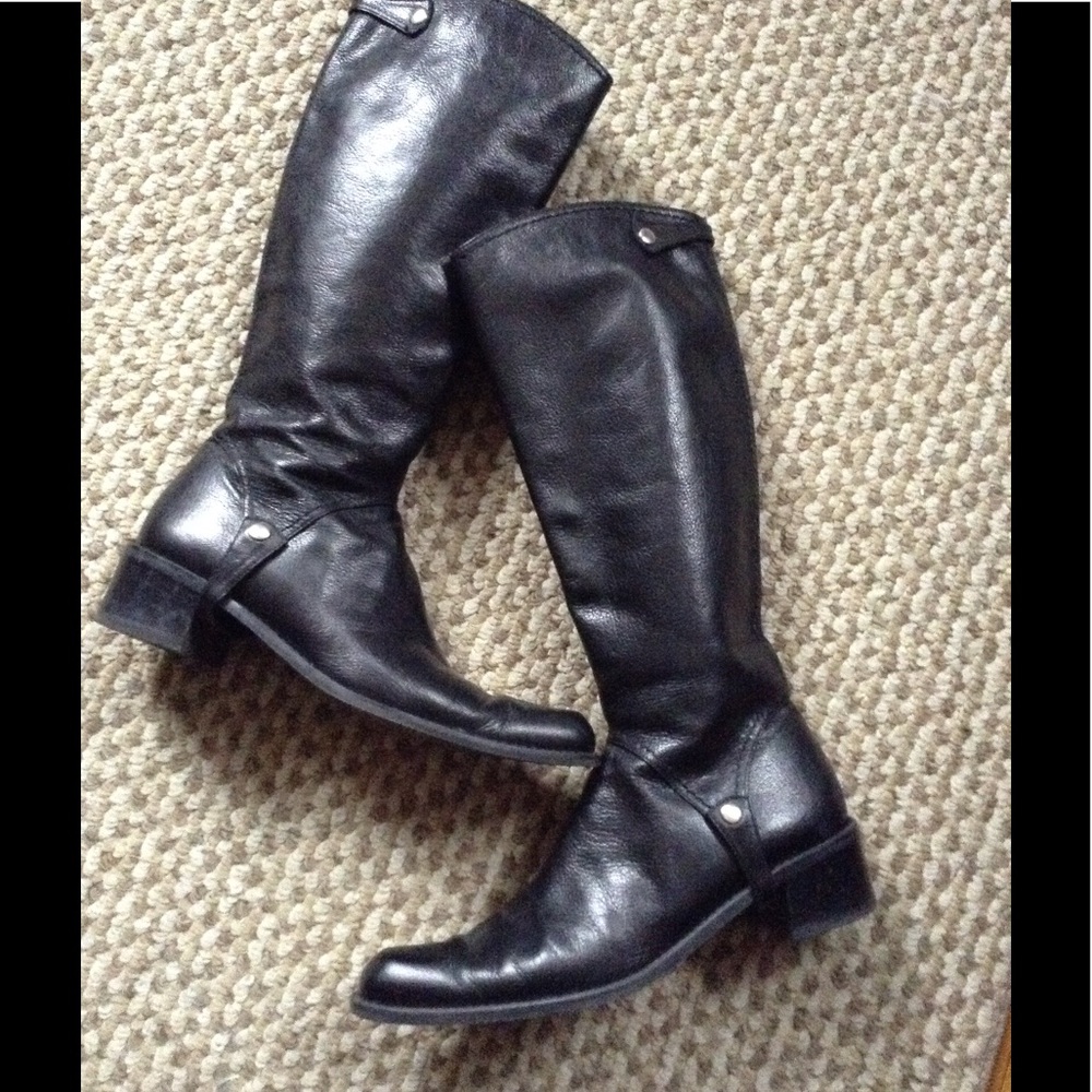 Stuart Weitzman leather riding boots.